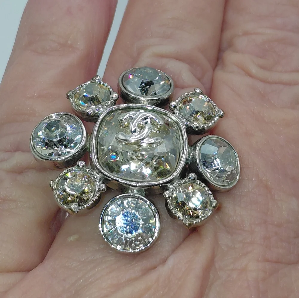 CHANEL Camelia Floral Swarovski Crystals Cocktail Ring in Silver. Sz 6.25